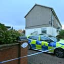 Cheslyn Hay, and alongside Littlewood Road, Police sit, as a murder enquiry takes place.