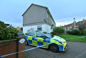 Cheslyn Hay, and alongside Littlewood Road, Police sit, as a murder enquiry takes place.