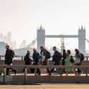 Commuters walking across London Bridge