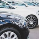 Cars in a row at a car dealer