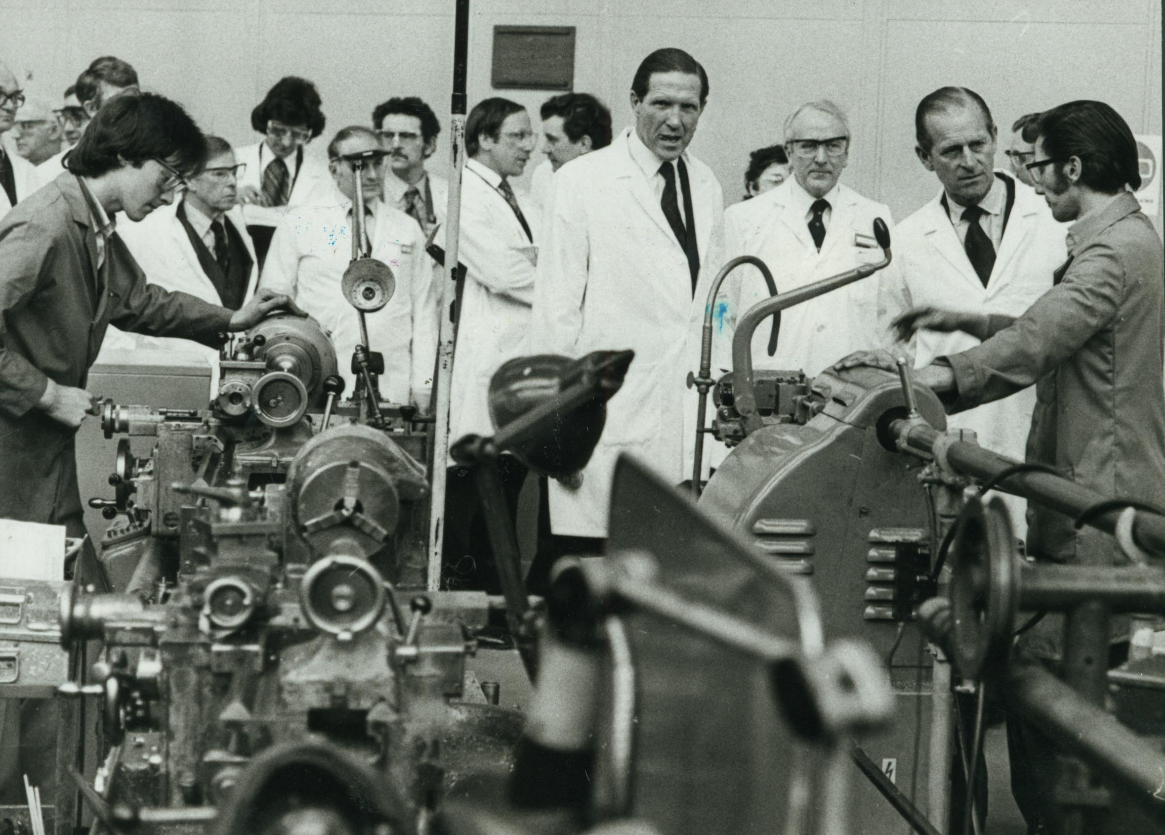 PICTURE FROM THE ARCHIVE: Prince Philip, the Duke of Edinburgh, pays a visit to Stafford in March 1978. During his tour, the Prince called in at GEC Measurements, donning a lab coat to chat with machine operators, staff, and directors on the factory floor. Did you work at GEC Measurements or remember when the Duke visited the site?