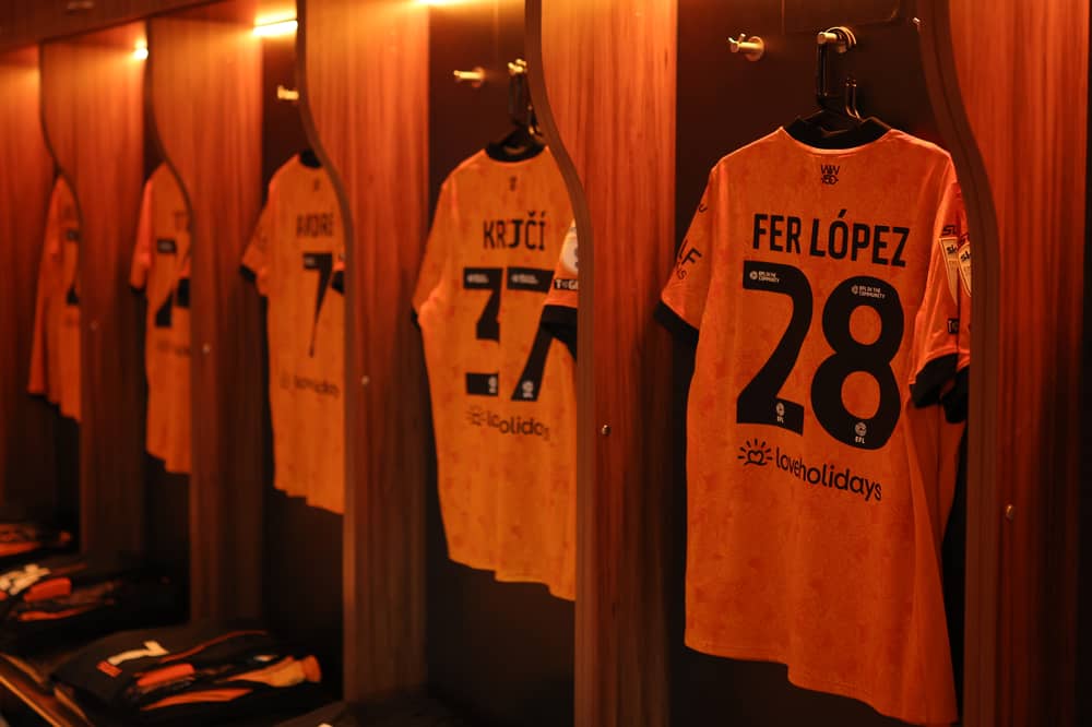Wolves shirts hanging in the dressing room