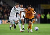 Fer Lopez brings the ball forward for Wolves against Bolton