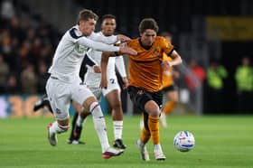 Fer Lopez brings the ball forward for Wolves against Bolton