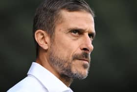 Watford manager Alessio Dionisi chews his lip on the touchline