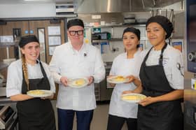 Summer Osbourne, Mayor Richard Parker, Maya Amir, and Amia Fishley taking part in an omelette making challenge. PIC: WMCA