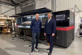 L to R: Simon Talbot, director of Kazoo PSG Ltd, and Martin Murray, leader of Staffordshire County Council, next to new printer