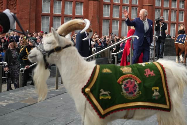 King Charles waves as he leaves the ceremonial opening of the Senedd (Alistair Grant/PA)