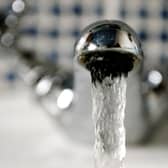 Water coming out of a tap