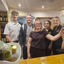 There's a warm welcome from the licensees and staff at the Greyhound. (L-R): Joe Dorrington, Matt Hogg, Dawn Hogg, Charley Guest and Lexie Poole