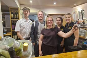 There's a warm welcome from the licensees and staff at the Greyhound. (L-R): Joe Dorrington, Matt Hogg, Dawn Hogg, Charley Guest and Lexie Poole