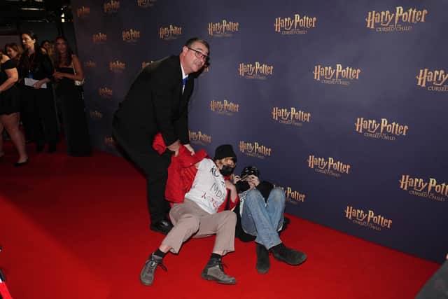 Trans rights protestors crashed the red carpet on Thursday (Jonathan Brady/PA)