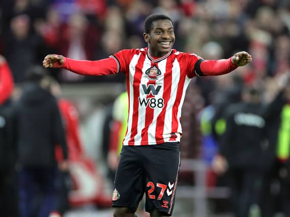 Noah Sadiki celebrates scoring