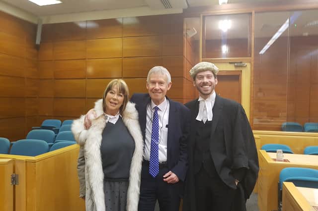 John Scott, centre, with wife Aideen and barrister son Jamie at Wolverhampton Crown Court on his last day at work