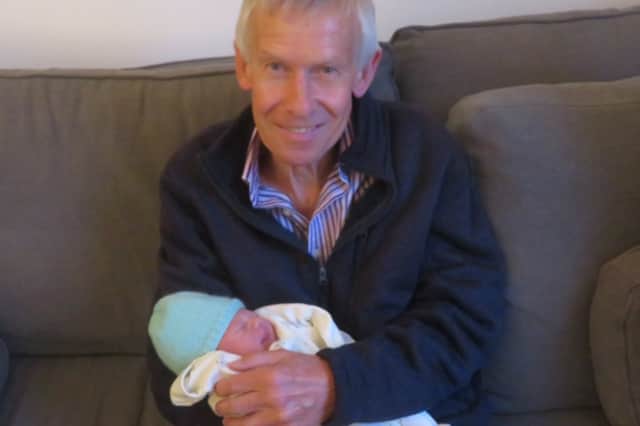 Proud John Scott with his grandson Julius
