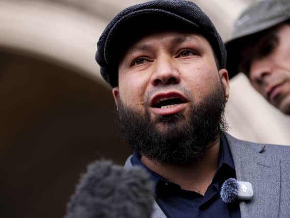 Mothin Ali speaking outside the Royal Court Of Justice