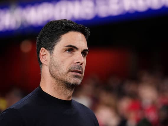Mikel Arteta looks on
