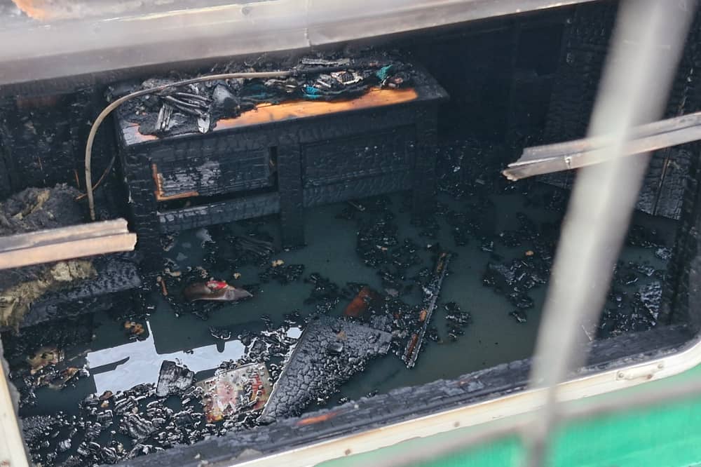 The boat was left blackened and burnt after the fire