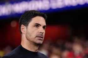 Mikel Arteta looks on