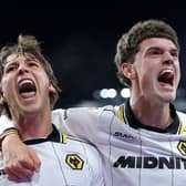 Fer Lopez (left) celebrates with Sean Neave after firing Wolves level at Burnley 