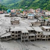 Buildings deluged in sludge in Devighat in Nepal's Nuwakot district after flash floods hit the area in August. More than 1,400 bodies have been found and thousands more are still missing. Picture: Prabin Ranabhat