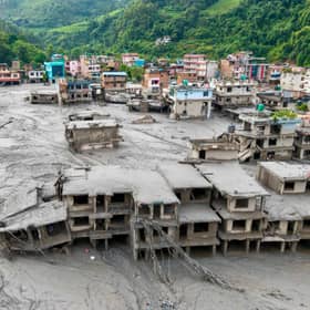 Buildings deluged in sludge in Devighat in Nepal's Nuwakot district after flash floods hit the area in August. More than 1,400 bodies have been found and thousands more are still missing. Picture: Prabin Ranabhat