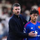 Manchester United manager Michael Carrick with Lisandro Martinez