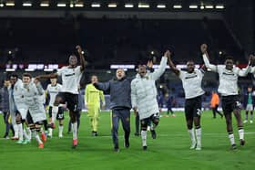 Wolves players celebrate their comeback win over Burnley