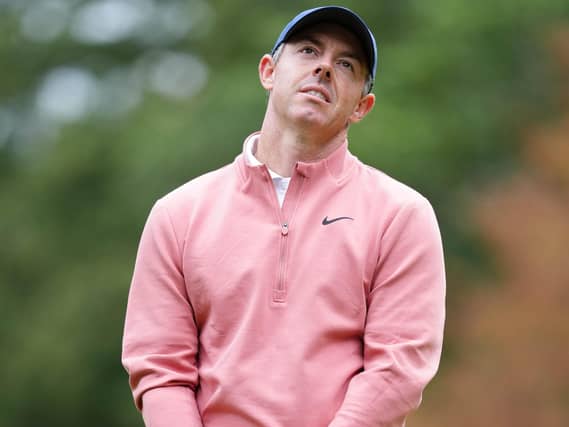 Rory McIlroy looks frustrated after a missed putt