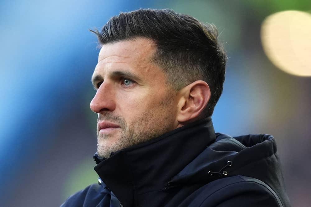 John Mousinho looks on