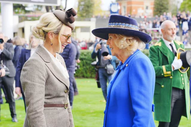 Queen Camilla talking with Zara Tindall at Ascot Racecourse (Ben Birchall/PA)