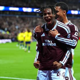 Aston Villa’s Johan Manzambi (left) celebrates scoring