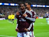 Aston Villa’s Johan Manzambi (left) celebrates scoring