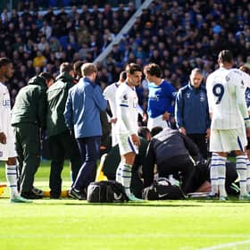 Chelsea goalkeeper Emiliano Martinez received treatment after a head clash at Everton (Mike Egerton/PA)