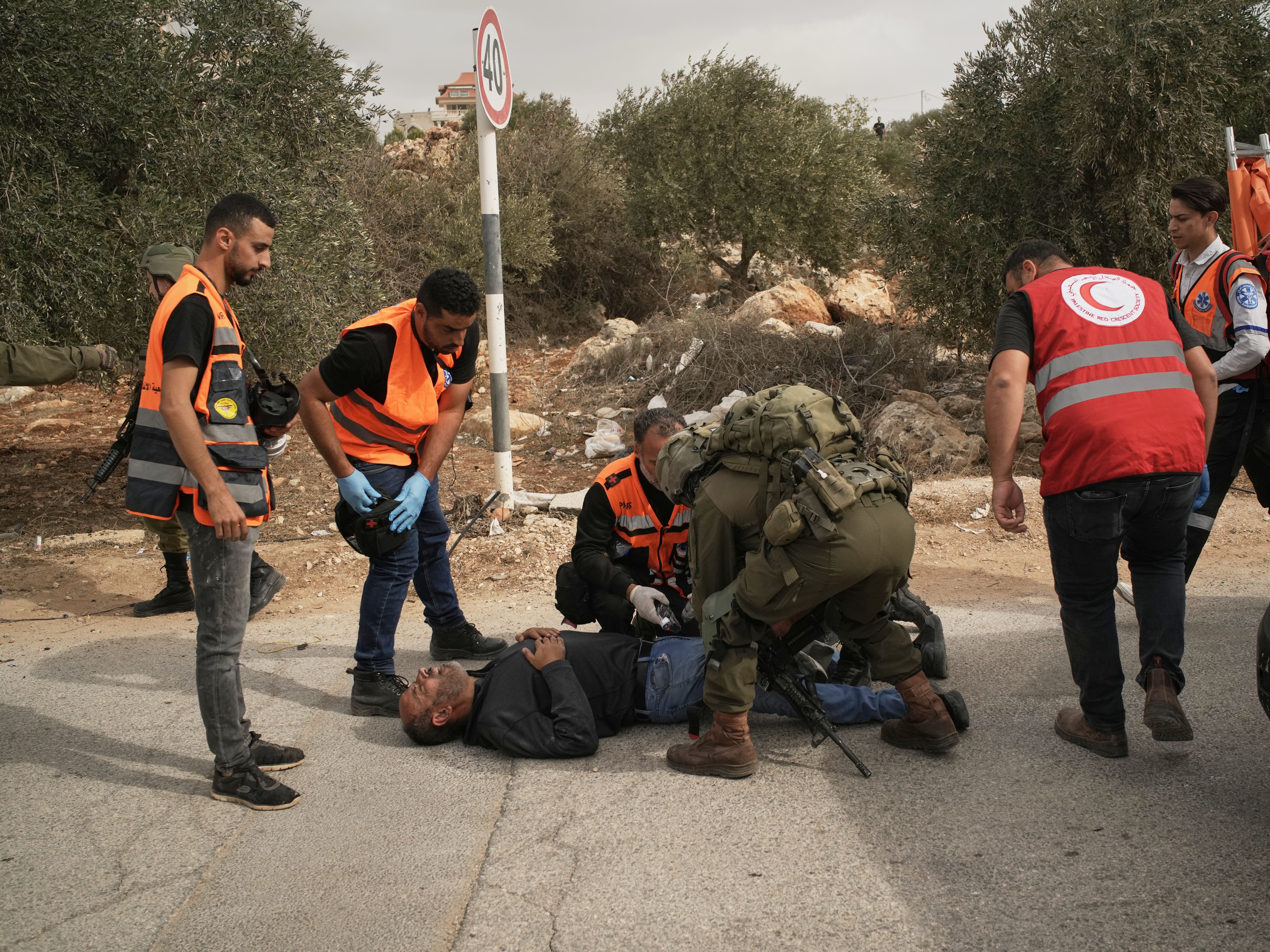 Photos show Israeli settler attacks disrupting the West Bank olive harvest