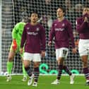 Burnley players react after conceding a second goal against Wolves