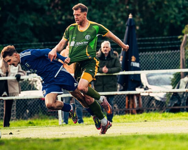 Lye Town's Alfie Didlock is brought down during the 6-5 thriller against AFC Wolverhampton City won by Lye.