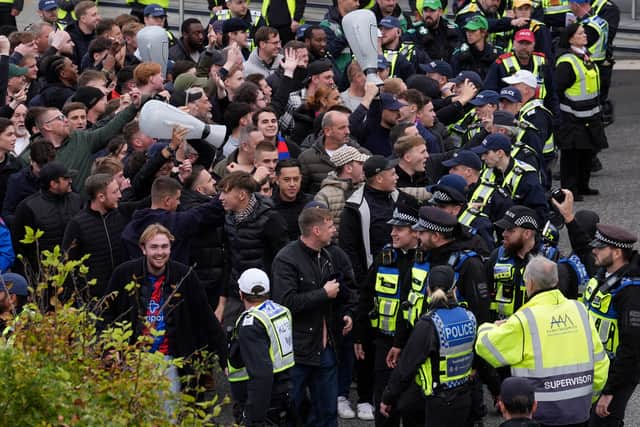 Crystal Palace fans taunted Brighton supporters with inflatable trophies before the match (Gareth Fuller/PA)