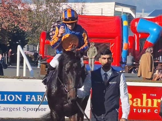 Come What May and Wayne Lordan after winning at Leopardstown