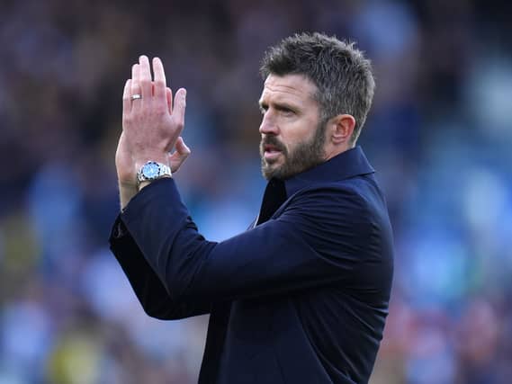 Michael Carrick applauds