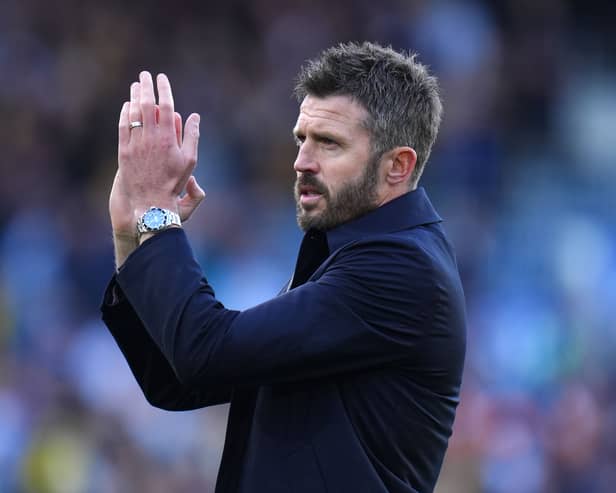 Michael Carrick applauds