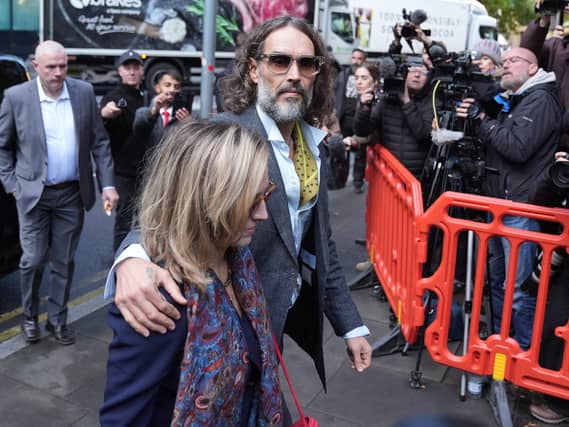 Russell Brand with his wife Laura Gallacher arriving at Southwark Crown Court