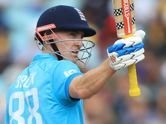 Harry Brook raises his bat