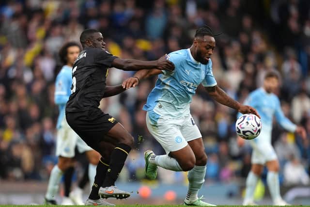 Ipswich’s Azor Matusiwa (left) and Manchester City’s Antoine Semenyo battle for the ball (Martin Rickett/PA)