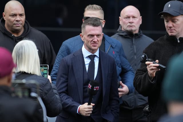 Tommy Robinson arrives at court ahead of harassment trial