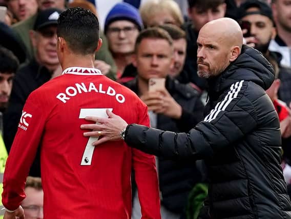 Manchester United’s Cristiano Ronaldo with manager Erik ten Hag after being substituted