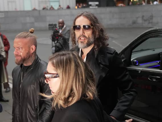 Russell Brand arrives at court