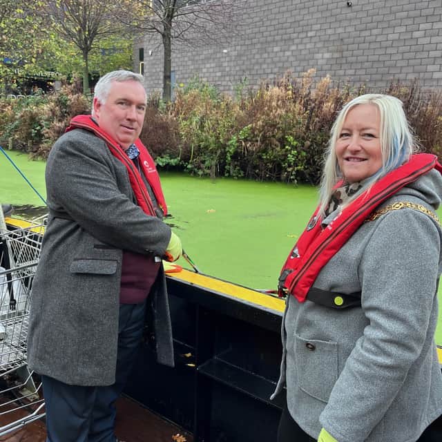 Councillors Adrian Andrew and Louise Harrison on board the Sister Dora last year