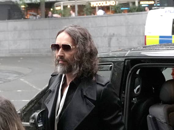 Russell Brand arrives at court