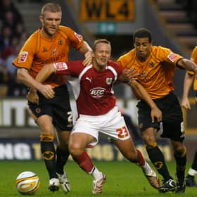 Darren Ward in Wolves action alongside Karl Henry